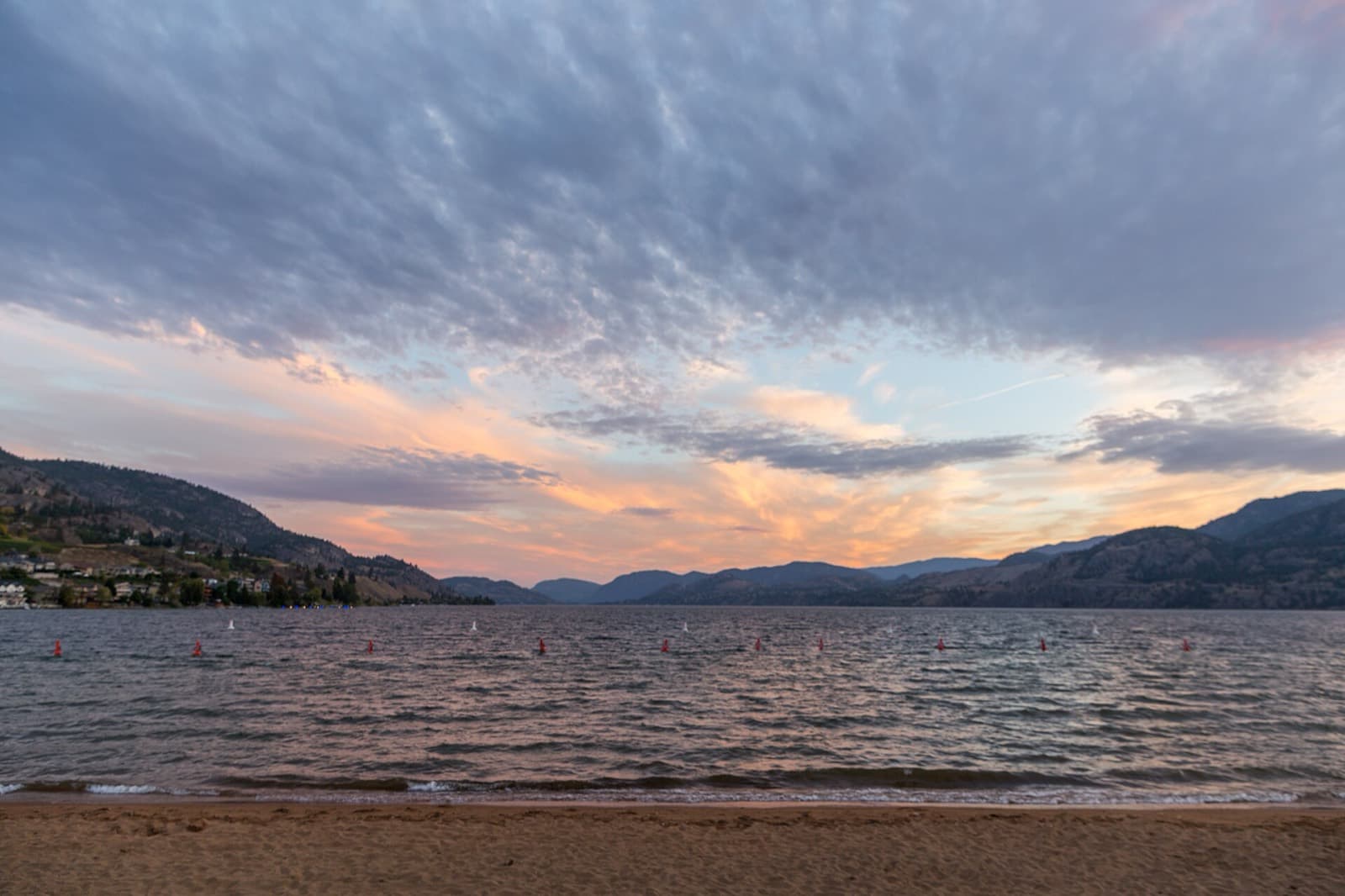 Ogopogo Extreme Triathlon: skaha lake at sunset with swim buoys