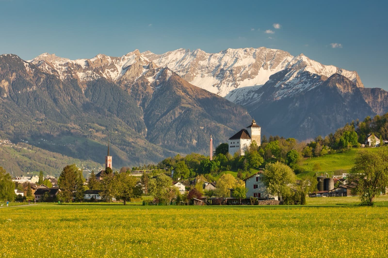 Swissultra Single Triathlon: werdenberg castle and town below the alvier/alpstein range, rhine valley near buchs sg