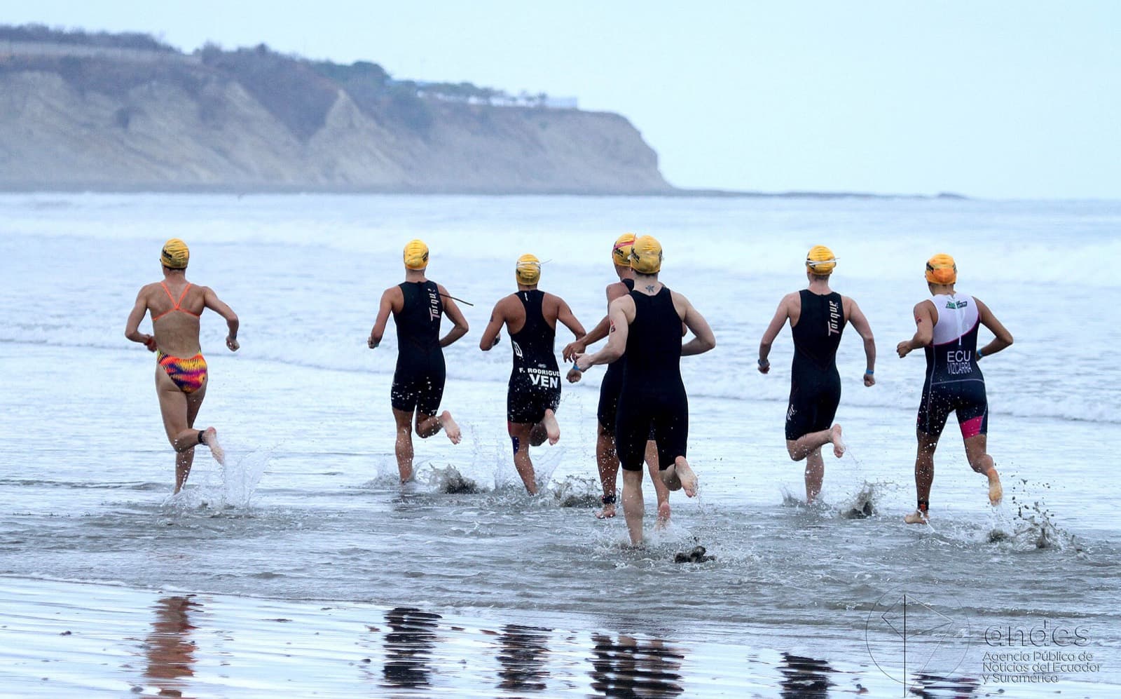 IRONMAN 70.3 Ecuador: triathletes swimming along the manta beach at ironman 70.3 ecuador (2016)