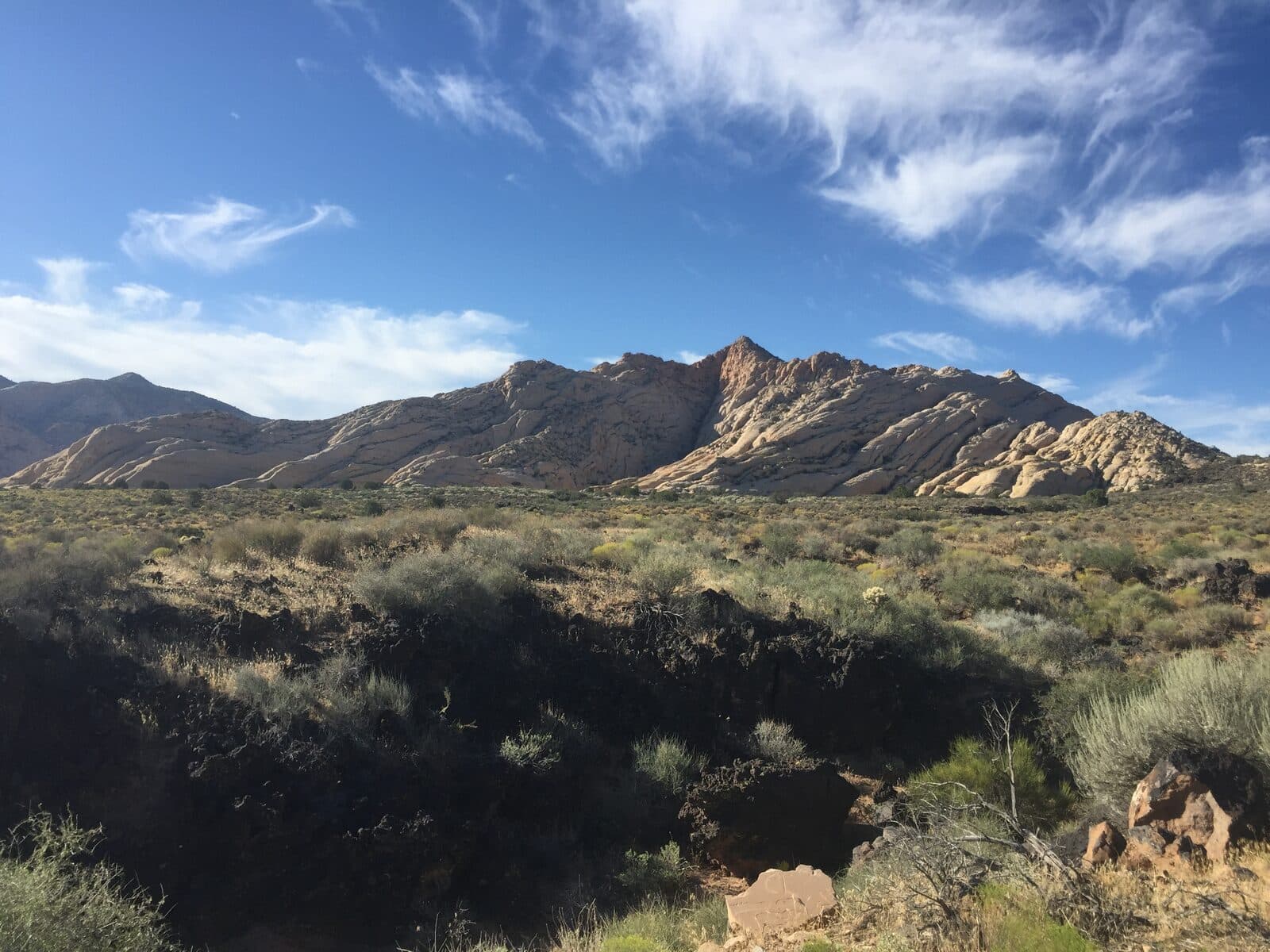 Snow Canyon Half Marathon: snow canyon state park, st george, utah: sandstone ridges above a lava-flow field