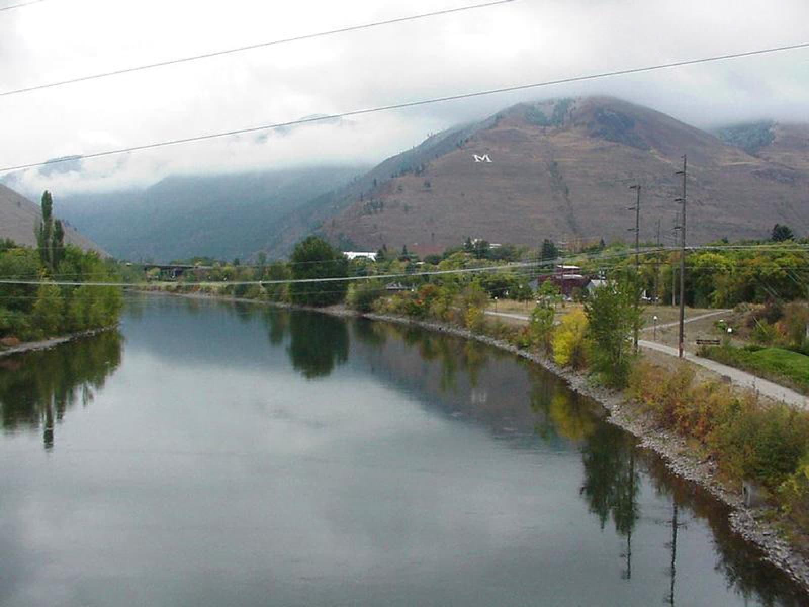 Dog Days ULTRA: mount sentinel and the 'm' above the clark fork, from the higgins bridge near the finish — destination scenery near missoula; not a photo of this event.