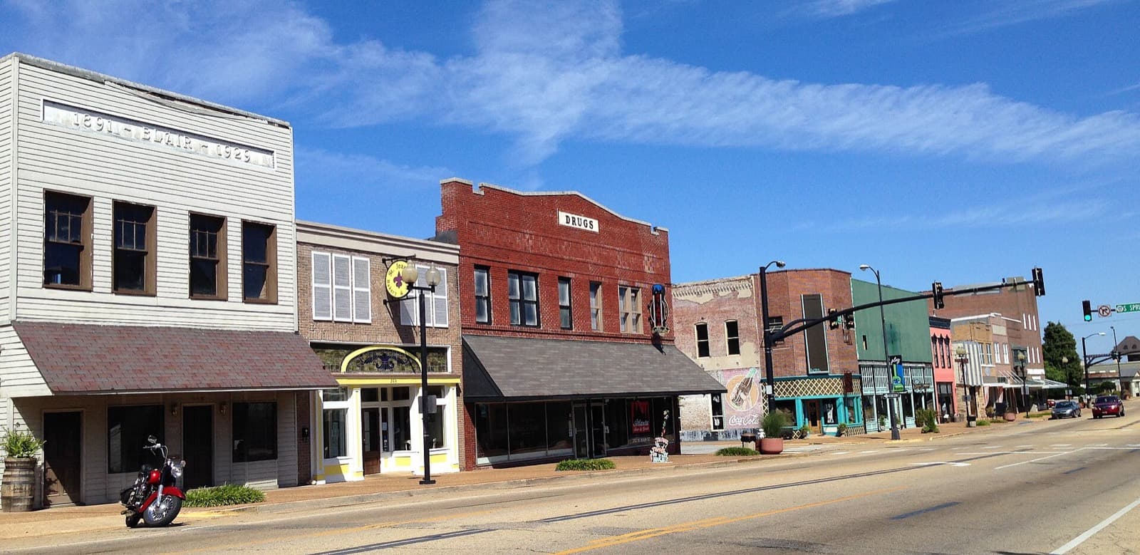 Tupelo Sprint Triathlon: historic brick storefronts on main street in downtown tupelo — destination scenery near tupelo; not a photo of this event.