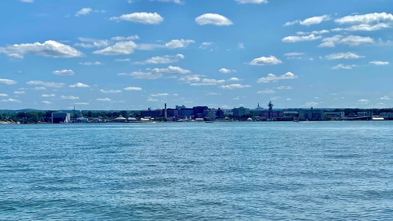 Erie Marathon at Presque Isle: downtown erie skyline across the bay from presque isle
