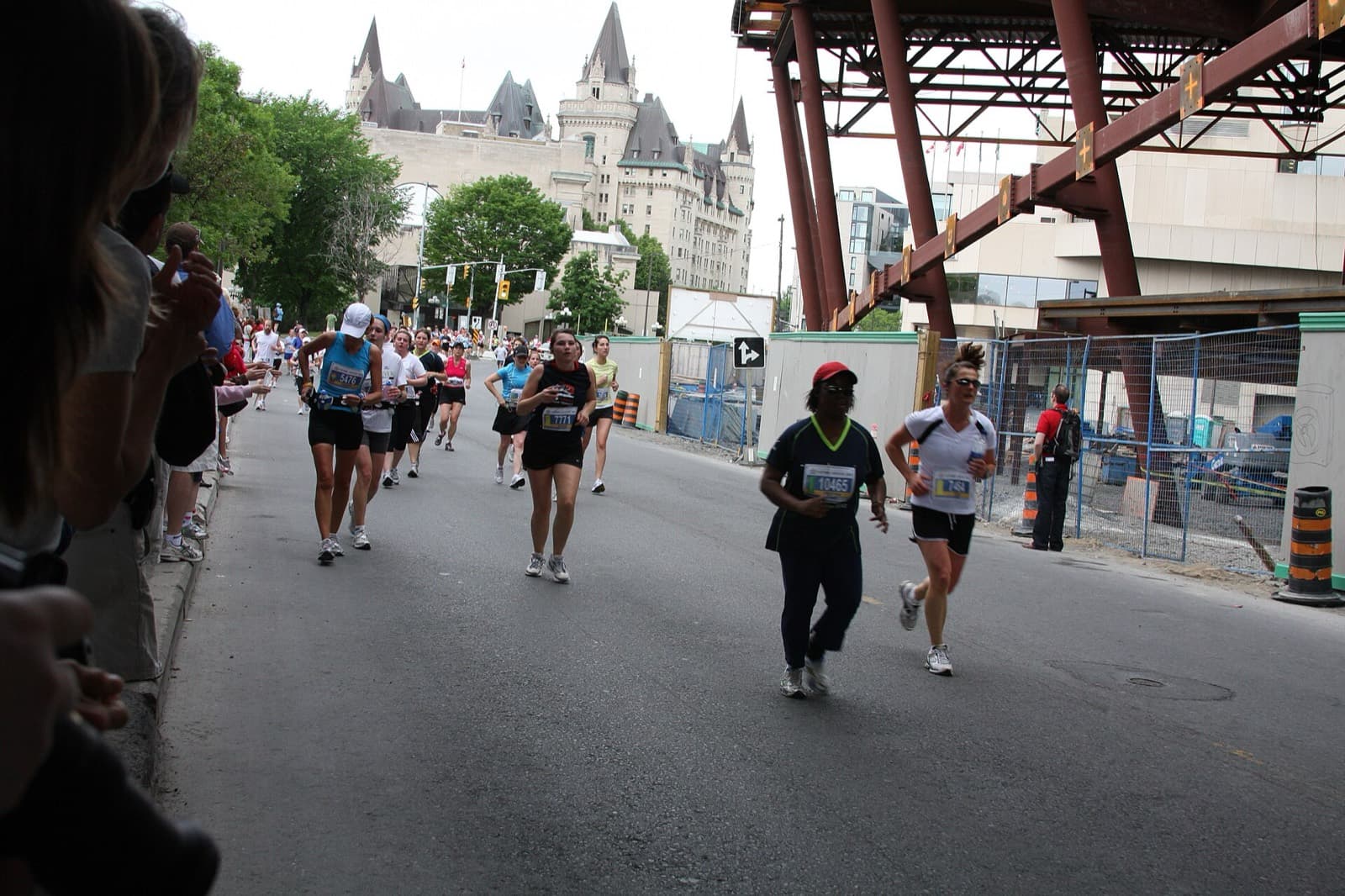 Tamarack Ottawa Race Weekend Marathon: runners passing the chateau laurier in downtown ottawa