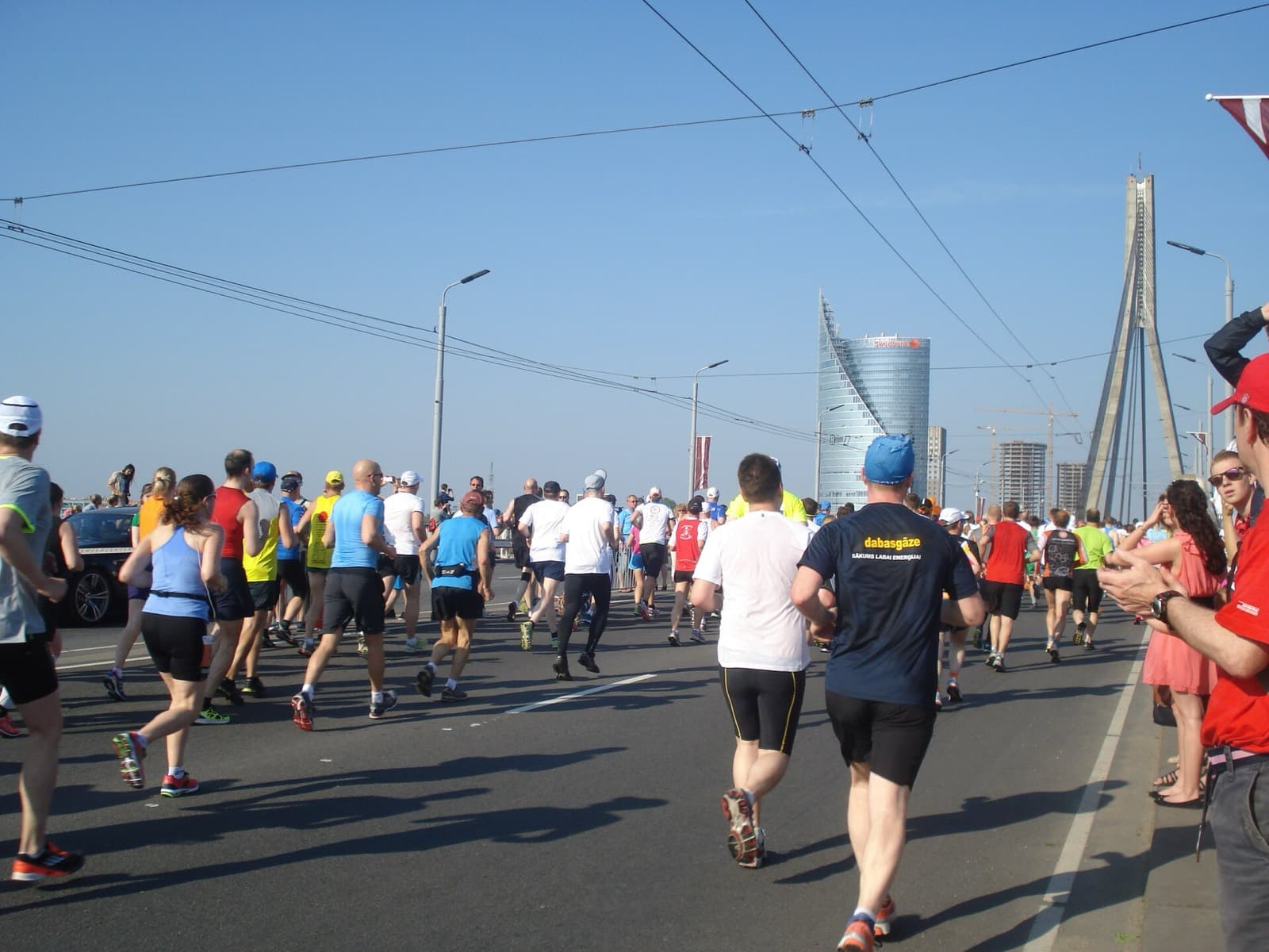 Rimi Riga Marathon: marathon runners crossing the vanšu bridge in riga, 2013