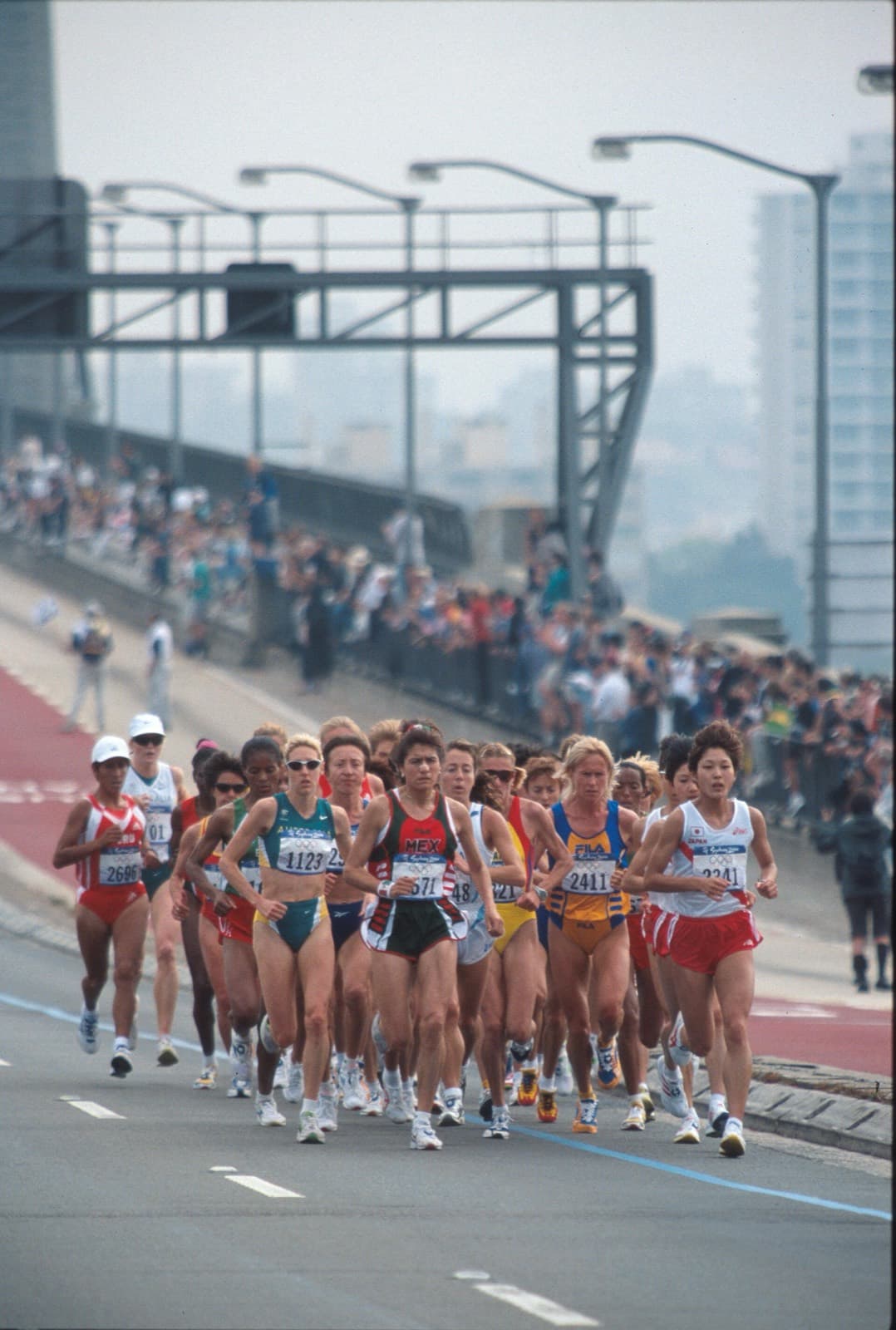 TCS Sydney Marathon: runners crossing the sydney harbour bridge in the 2000 olympic women's marathon, on the stretch the tcs race also uses