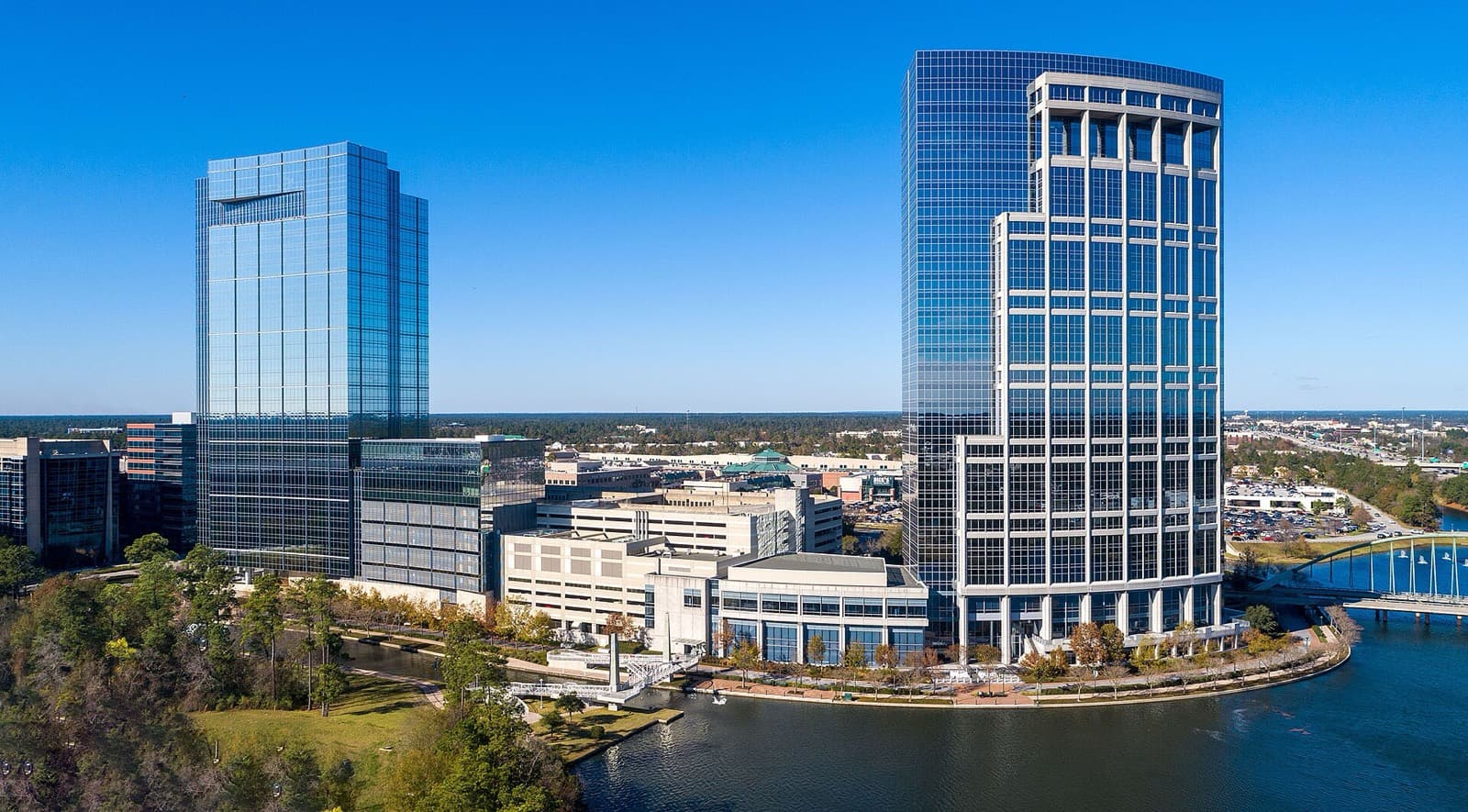 The Woodlands Marathon: aerial of towers beside the waterway, where the marathon finishes