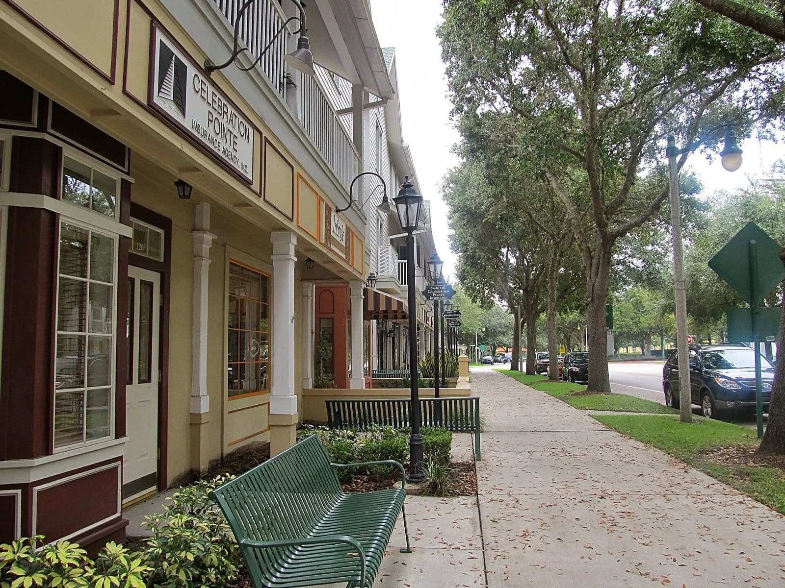 Town of Celebration Marathon: tree-lined shopfront street in the town of celebration, near the course