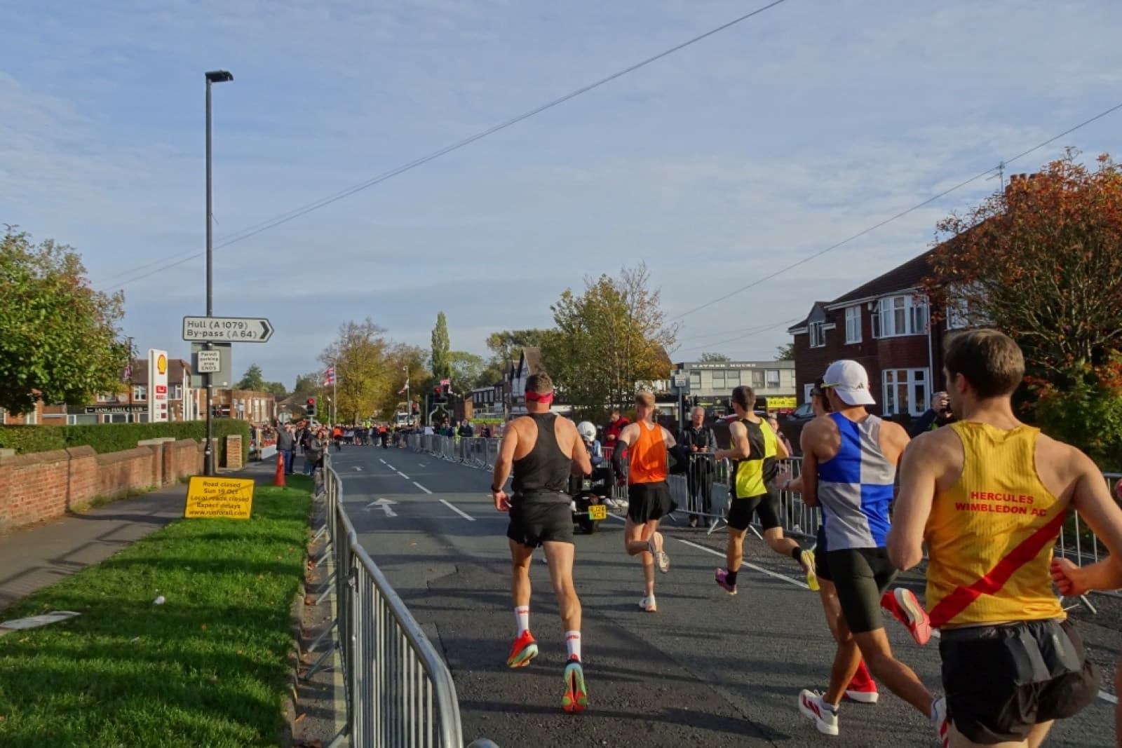 Yorkshire Marathon: lead runners on green dykes lane near the start of the yorkshire marathon