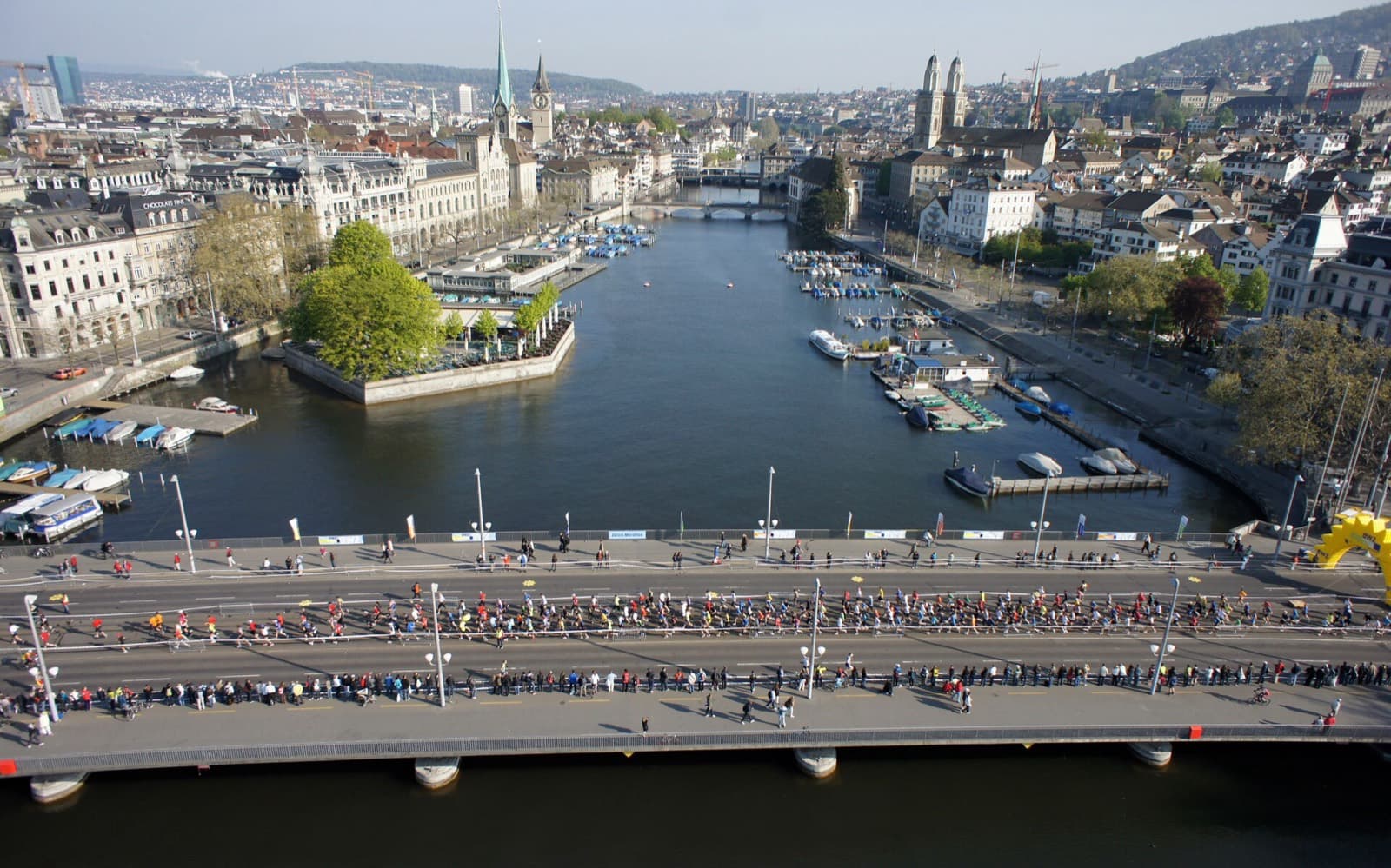 Zurich Marathon: aerial view of the field crossing quaibrücke over the limmat