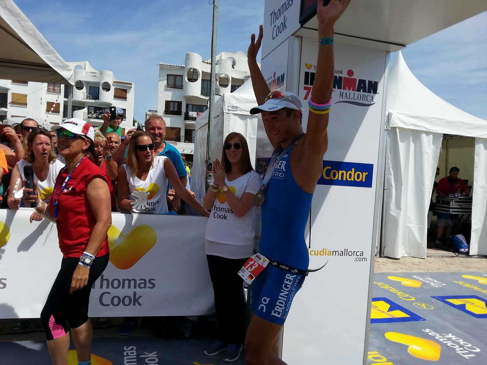 IRONMAN 70.3 Alcúdia-Mallorca: finish area with crowd, ironman 70.3 alcúdia-mallorca