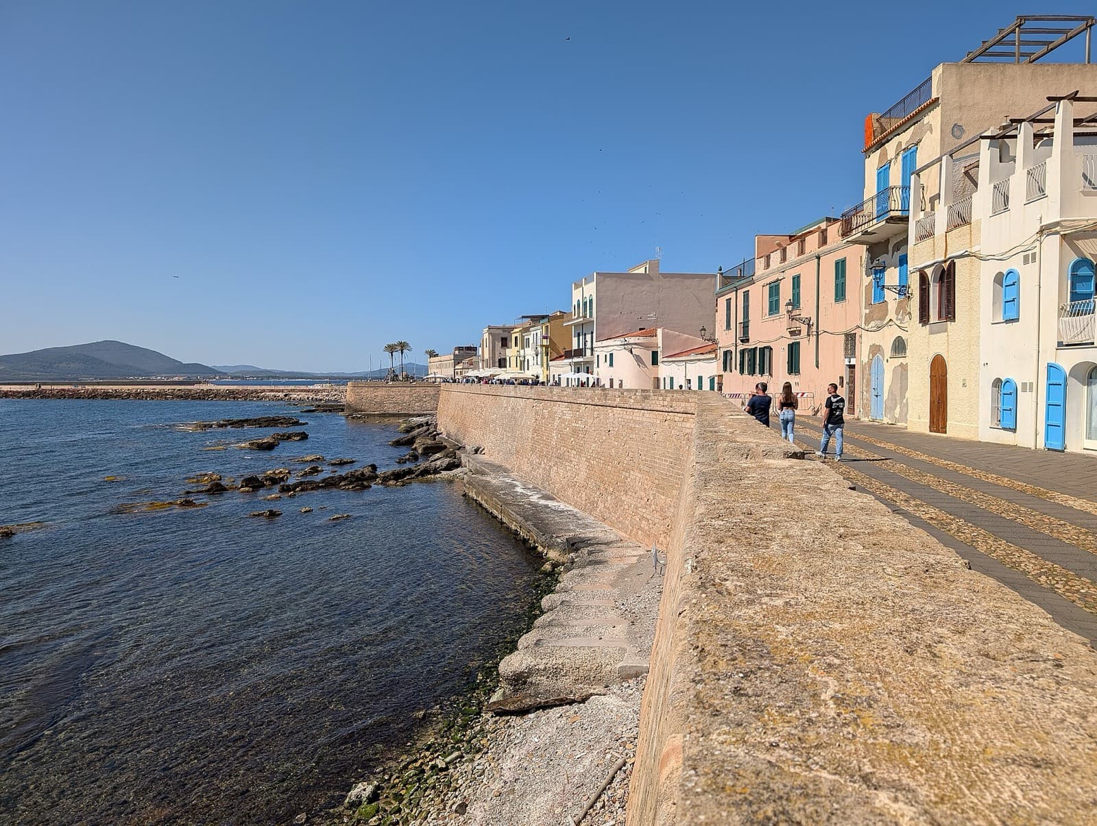 IRONMAN 70.3 Alghero: alghero old-town bastions over the sea, run-course landmark