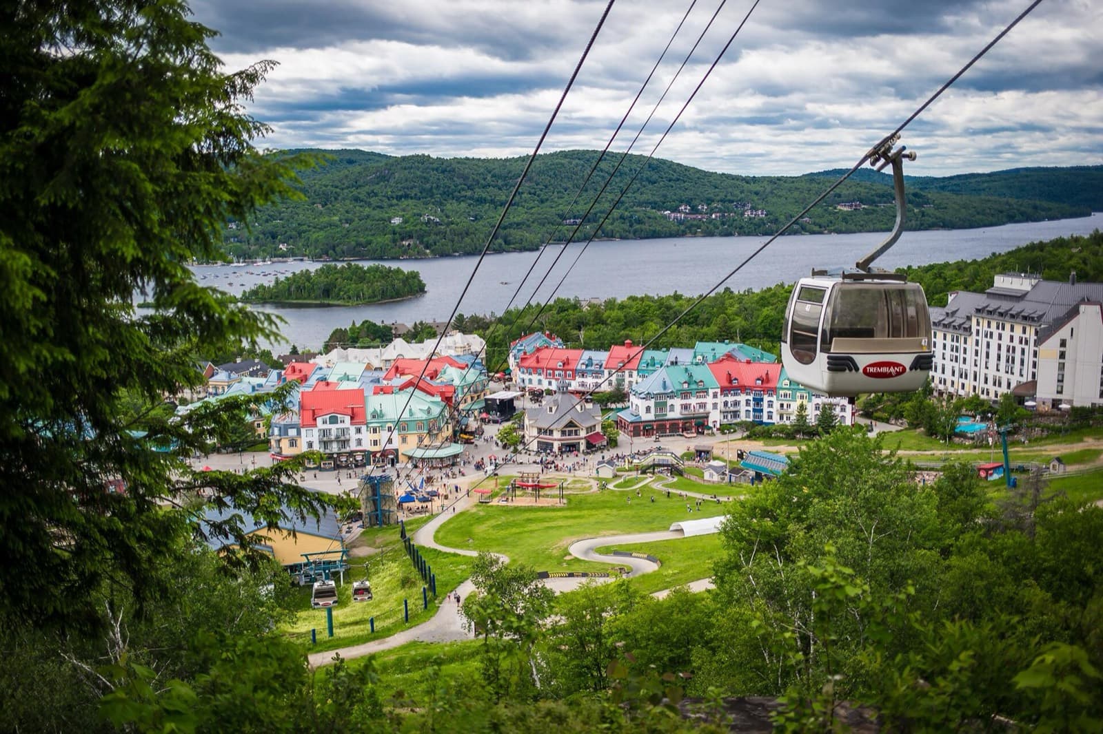IRONMAN 70.3 Mont-Tremblant: tremblant resort village, lake and forested hills seen from the gondola