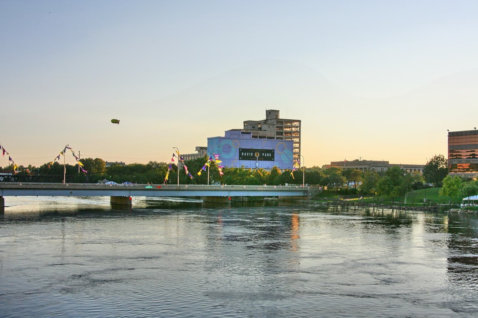 IRONMAN 70.3 Rockford - Illinois: rock river with flag-lined bridge and davis park (swim exit), downtown rockford