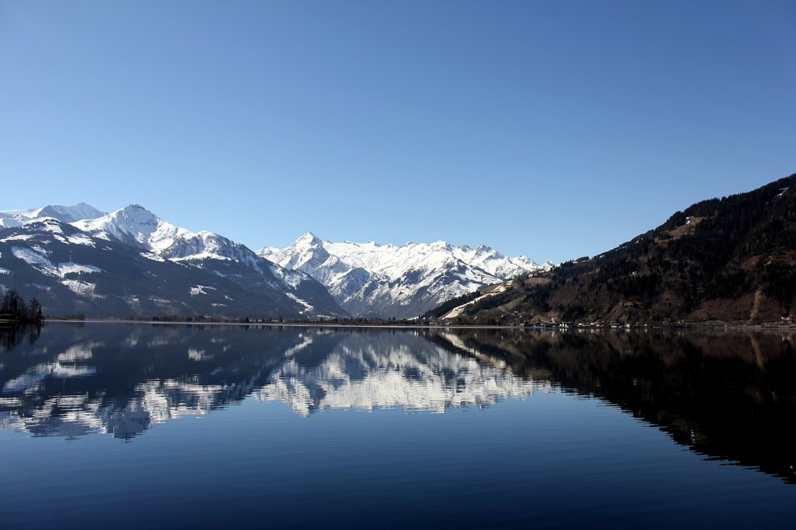 IRONMAN 70.3 Zell am See-Kaprun: lake zell with snow-capped alps