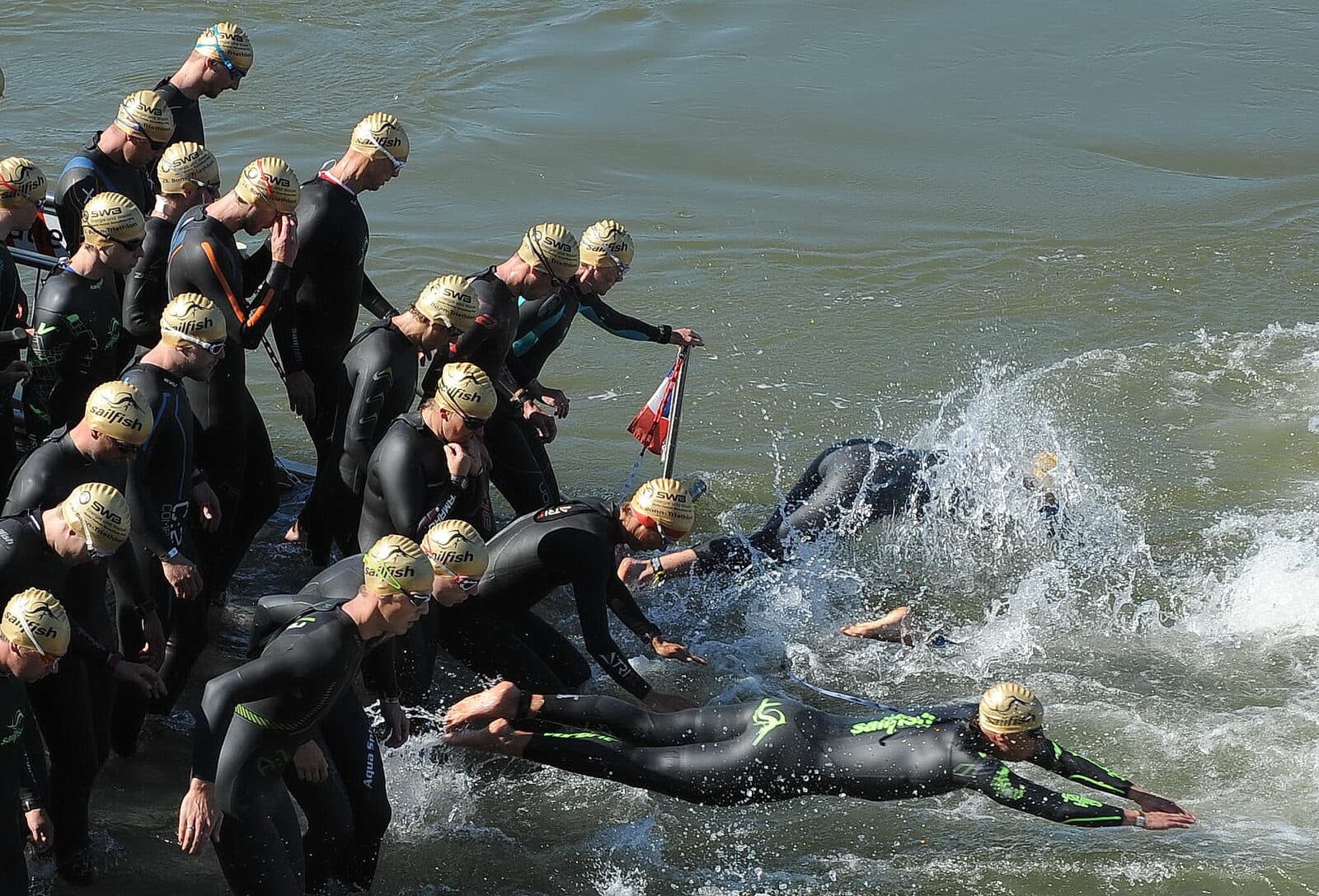 RYZON Bonn Triathlon: swim start from a ferry boat on the rhine at the bonn triathlon