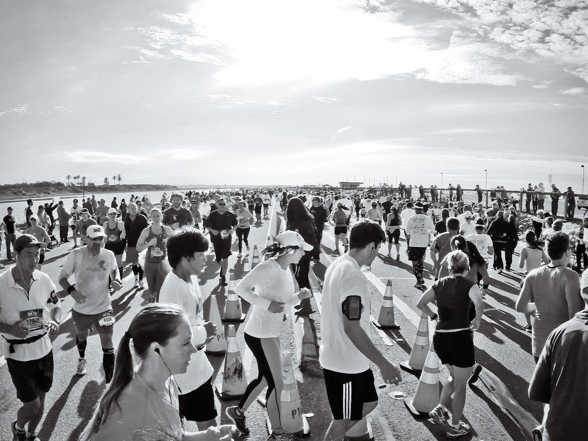 Surf City Marathon & Half Marathon: runners in the surf city huntington beach half marathon on the coastal course.