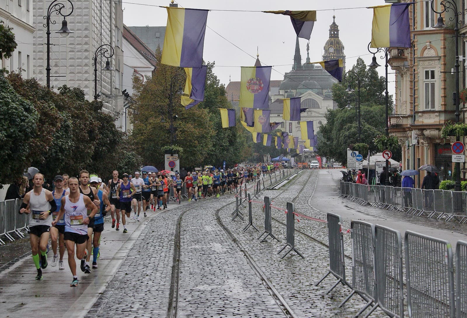 Košice Peace Marathon: runners on main street with the cathedral behind during the 2020 košice peace marathon