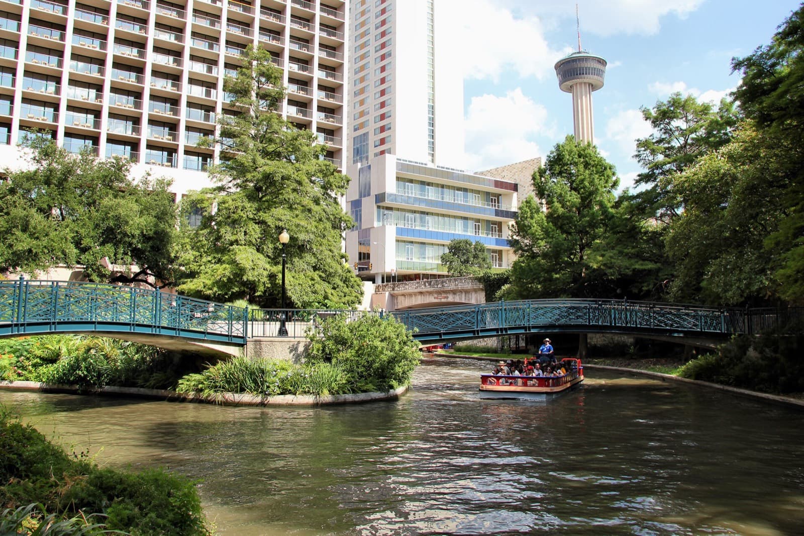 San Antonio Marathon: san antonio river walk with the tower of the americas near the hemisfair finish