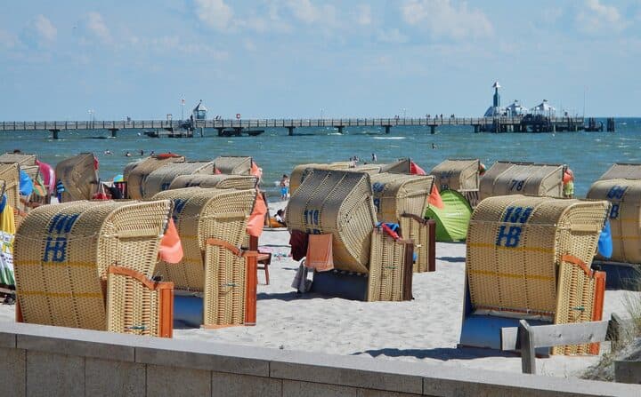 Beach chairs and pier on the beach at Grömitz