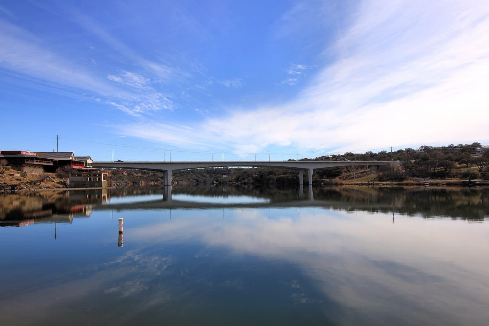 Marble Falls Triathlon: lake marble falls with highway bridge, texas hill country