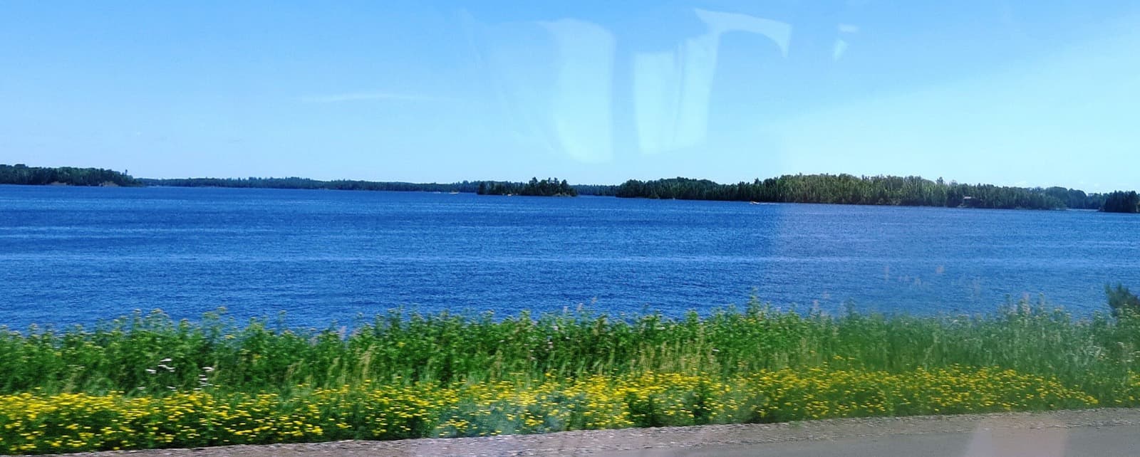 Brewhouse Triathlon: island lake reservoir, the swim venue (shot from a vehicle)