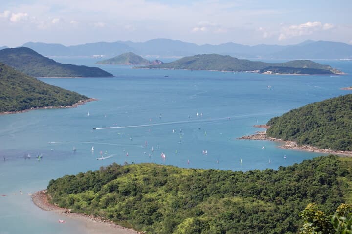 Sai Kung Country Park coastline and wooded islands, outside race day; regional destination scenery, not a verified course segment