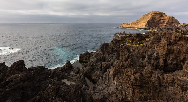 Natural volcanic pools and lava coast at Porto Moniz, the route's start on Madeira's north-west coast; outside race day